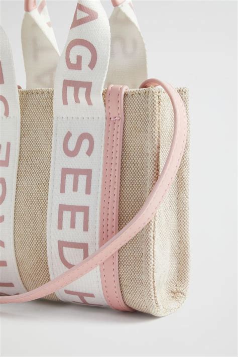 seed heritage handbags sale.